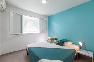 Voodi või voodid majutusasutuse SeaCove & SeaSide Villas, classées 4 étoiles toas