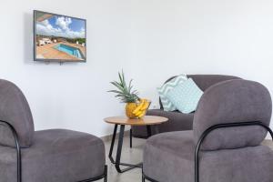 Istumisnurk majutusasutuses SeaCove & SeaSide Villas, classées 4 étoiles