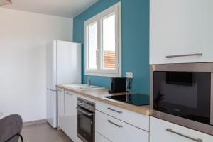 Köök või kööginurk majutusasutuses SeaCove & SeaSide Villas, classées 4 étoiles