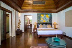 Katil atau katil-katil dalam bilik di Beachfront Resort Villa Baan Lotus 4BR