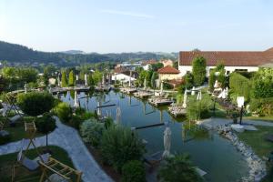 an overhead view of a river with boats in it at Wellness- & Sporthotel Jagdhof in Röhrnbach