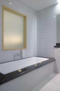 Ванна кімната в Mutiara Hotel and Convention