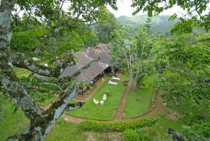 an aerial view of a house with a garden at Lake Palace in Thekkady