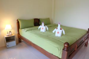 Postel nebo postele na pokoji v ubytování Chokdee Resort