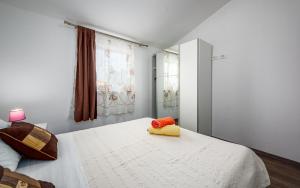 Postel nebo postele na pokoji v ubytování Apartment Kraljevic