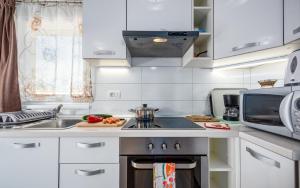 Kuchyň nebo kuchyňský kout v ubytování Apartment Kraljevic