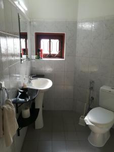 Koupelna v ubytování Ayubowan Guesthouse