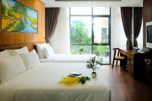 Ένα ή περισσότερα κρεβάτια σε δωμάτιο στο Nagila Boutique Hotel