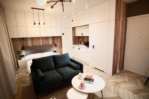 Kuchyňa alebo kuchynka v ubytovaní ONE Apartamenty Gąsiorowskich 4