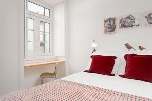 מיטה או מיטות בחדר ב-Oporto Classic Pàtio