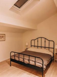 Säng eller sängar i ett rum på Maison Demar