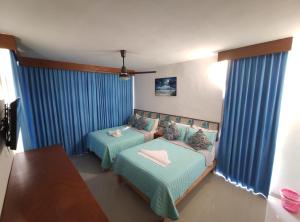 Postel nebo postele na pokoji v ubytování Kai Hotel + 27 fotografií