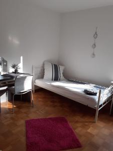 En eller flere senger på et rom på Apartment Ground Floor Laatzen