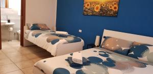 Postel nebo postele na pokoji v ubytování B&B SUPERFAST