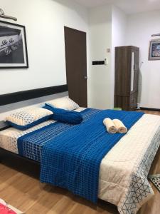 Postel nebo postele na pokoji v ubytování Home Suhaila