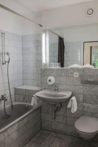 Ванная комната в Hotel Restaurant Seegarten
