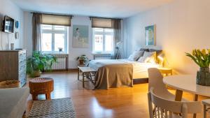Posteľ alebo postele v izbe v ubytovaní Cocorico Apartments