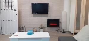 TV a/nebo společenská místnost v ubytování La Casa de Yiyi