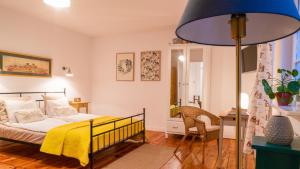 Posteľ alebo postele v izbe v ubytovaní Cocorico Apartments
