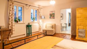 Posteľ alebo postele v izbe v ubytovaní Cocorico Apartments