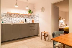 Kuchyňa alebo kuchynka v ubytovaní Cocorico Apartments