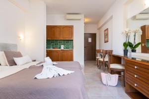 Postel nebo postele na pokoji v ubytování Villas Duc - Rhodes