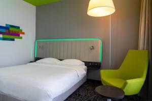 Кровать или кровати в номере Park Inn by Radisson, Nairobi Westlands