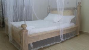 Ένα ή περισσότερα κρεβάτια σε δωμάτιο στο Hotel Skypa