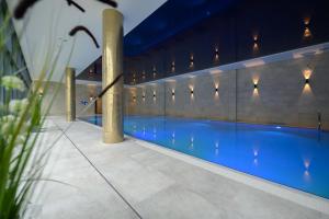 Bazén v ubytování Aparthotel Termy Uniejów nebo v jeho okolí