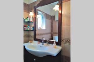 Kylpyhuone majoituspaikassa Fiorela maisonette