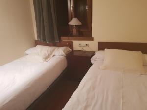 Postel nebo postele na pokoji v ubytování Apartamento salardu