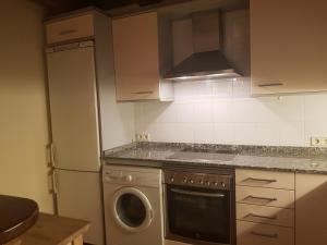 Kuchyň nebo kuchyňský kout v ubytování Apartamento salardu + 1 fotografie