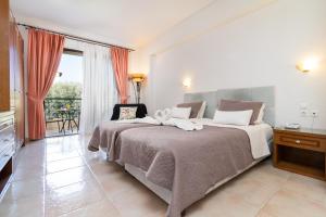 Postel nebo postele na pokoji v ubytování Villas Duc - Rhodes + 37 fotografií