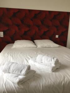 Tempat tidur dalam kamar di Les Terrasses de Bella Vista - Belle maison bord de mer