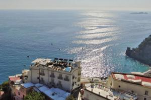 an aerial view of a building and the ocean at Hotel Villa Franca in Positano