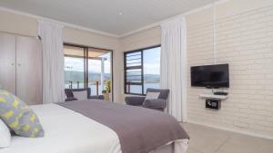 Μια τηλεόραση ή/και κέντρο ψυχαγωγίας στο Interlaken Guest House
