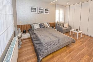 Posteľ alebo postele v izbe v ubytovaní KOMFORT HOUSE RYNEK