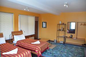 Voodi või voodid majutusasutuse Dondrub Guest House toas