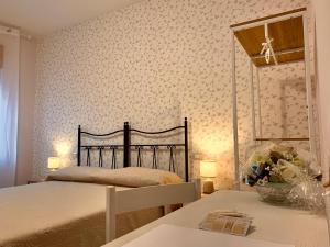 Katil atau katil-katil dalam bilik di B&B Mariele