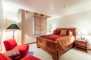 Cama ou camas em um quarto em Mountain Village Dream