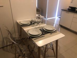 Η κουζίνα ή μικρή κουζίνα στο Asuncion Gracia Suites