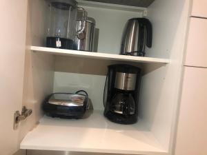 Η κουζίνα ή μικρή κουζίνα στο Asuncion Gracia Suites