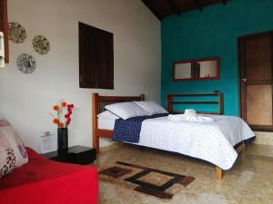 Postel nebo postele na pokoji v ubytování Hotel Dulce Campestre