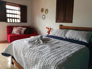 Postel nebo postele na pokoji v ubytování Hotel Dulce Campestre