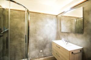 Koupelna v ubytování Landhaus Lodges Kaprun by we rent + 37 fotografií