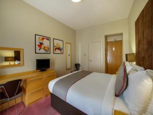 Cama o camas de una habitación en OYO Flagship Brentwood