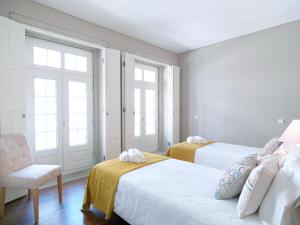 Postel nebo postele na pokoji v ubytování FLH Porto Bright Flat