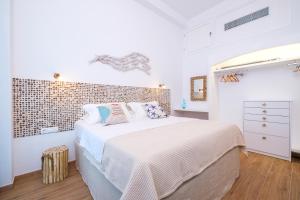 Letto o letti in una camera di Aelia Collection Suites - Adults Friendly