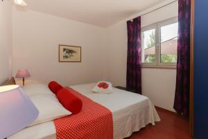 Postel nebo postele na pokoji v ubytování Casa Zorana-Alba Apartments