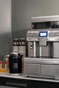 a coffee maker sitting on top of a counter at 22 Hill Hotel in Reykjavík